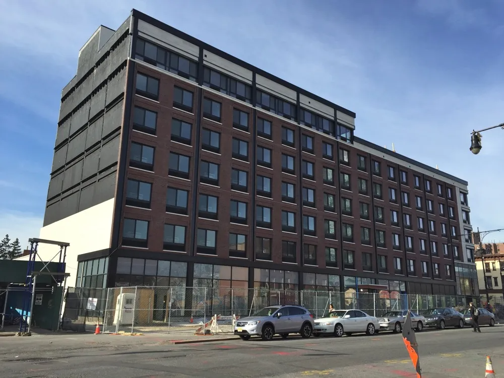 multi-story building with commercial groundfloor