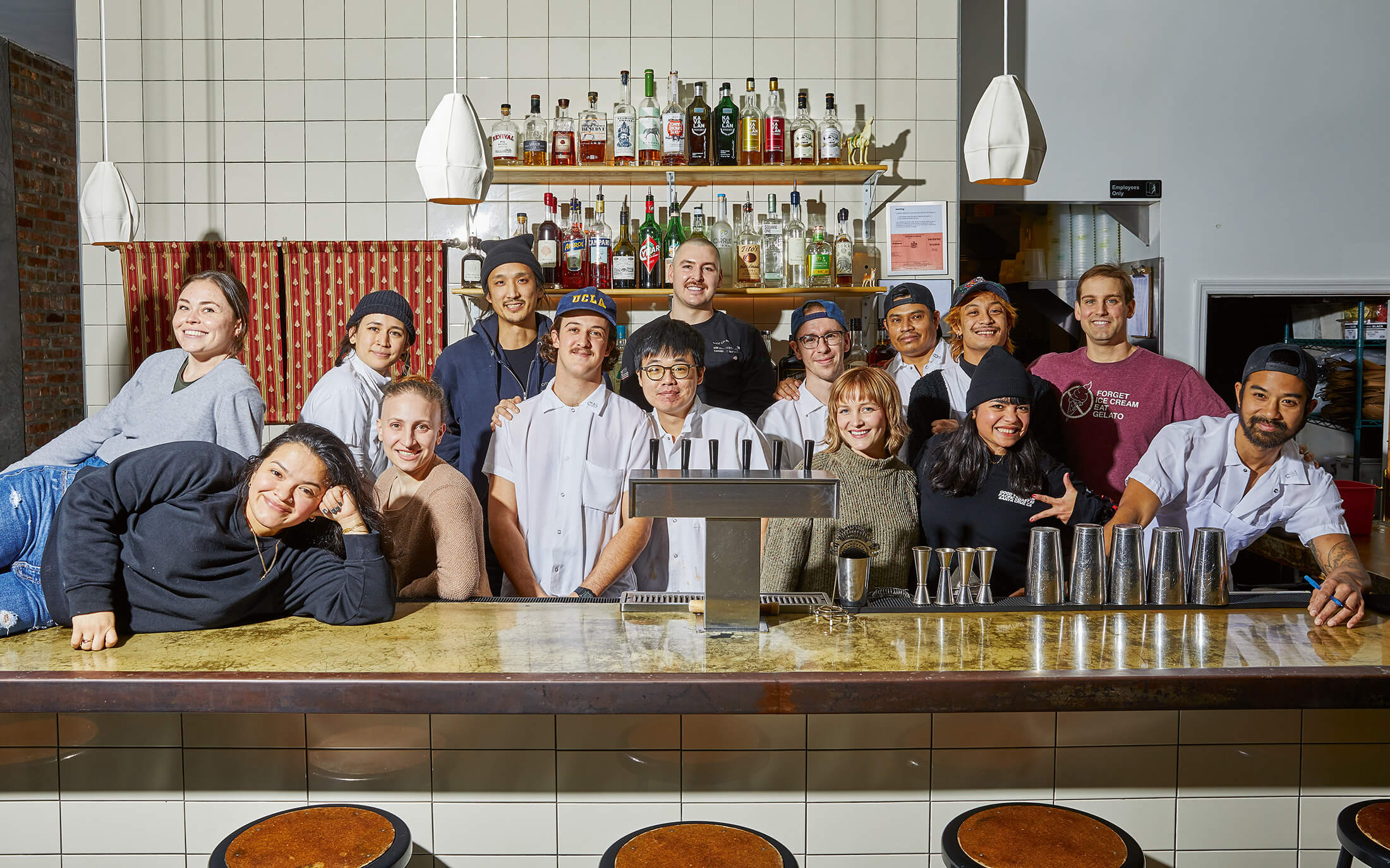 the team at Win Son standing behind a counter