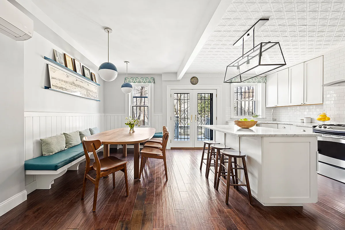 kitchen with tin ceiling, doors to garden