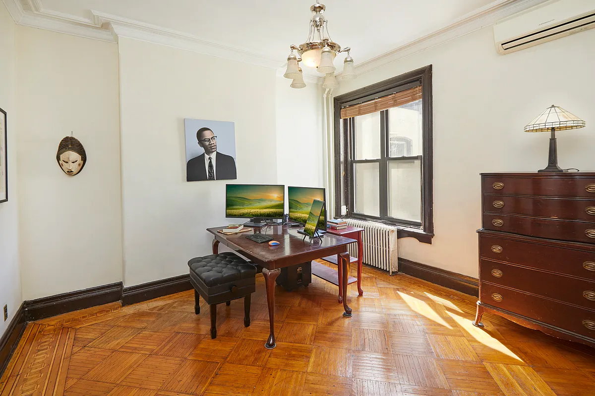office with wood floor, white walls