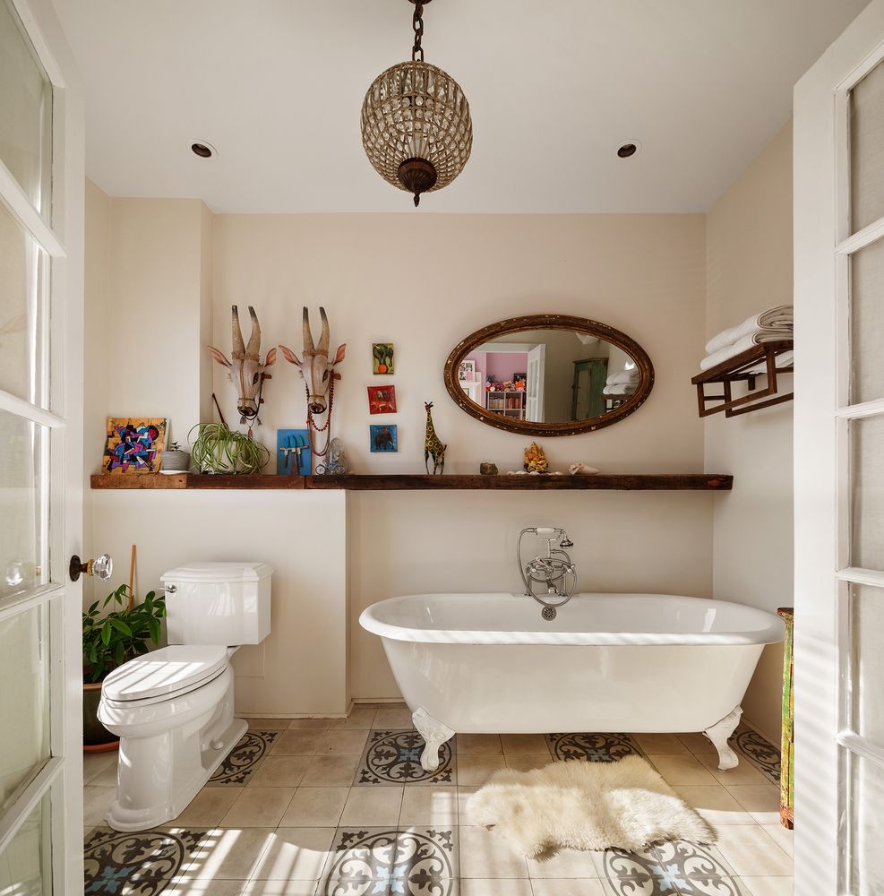 bedroom with claw foot tub